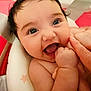 Brooklyn is registered to the contest to win money with this photo: baby, candid, cheerful, child, closeup, cute, expression, face, finger, hand, happy, indoors, infant, joyful, person, playful, portrait, skin, smiling, young
