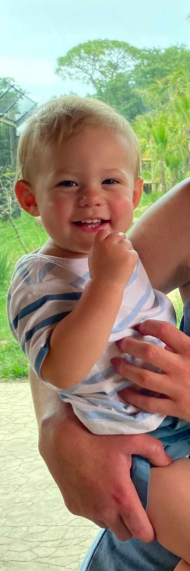 Stetson joined the competition — help win amazing prizes! child, toddler, smiling, blonde_hair, striped_shirt, outdoor, greenery, adult_hand, happy, portrait, person, cute, baby, nature, holding, casual_clothing, daylight, skin, face, expression