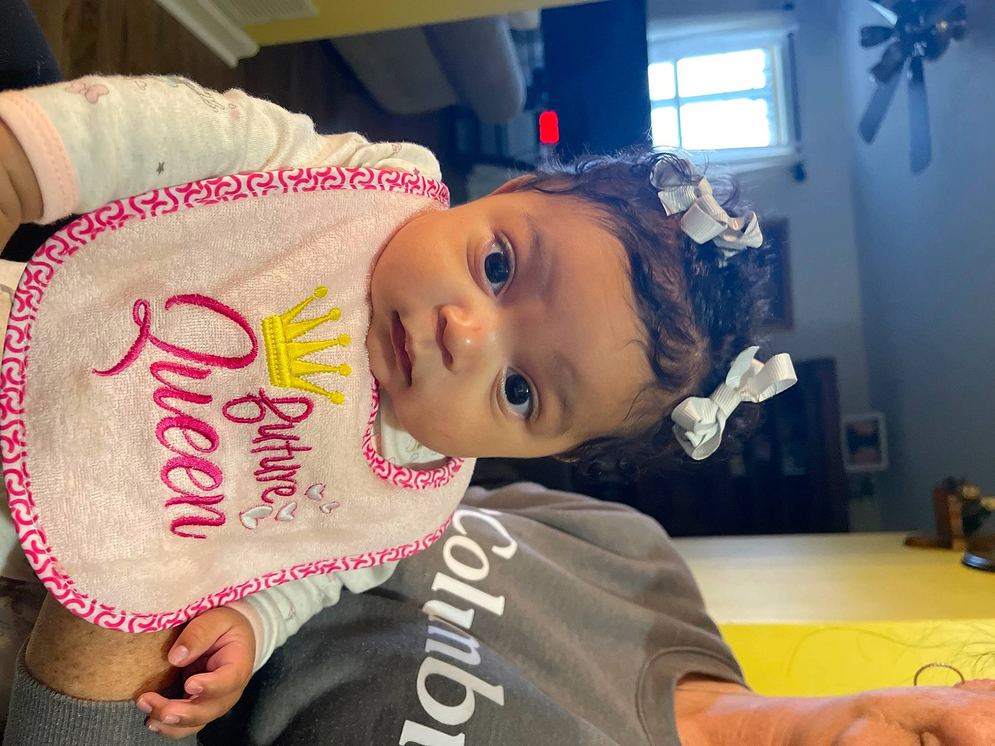 Kamora is registered to the contest to win money with this photo: baby, baby_toddler_clothing, cheek, child, event, fun, hairstyle, happy, hat, person, room, toddler, tradition, window