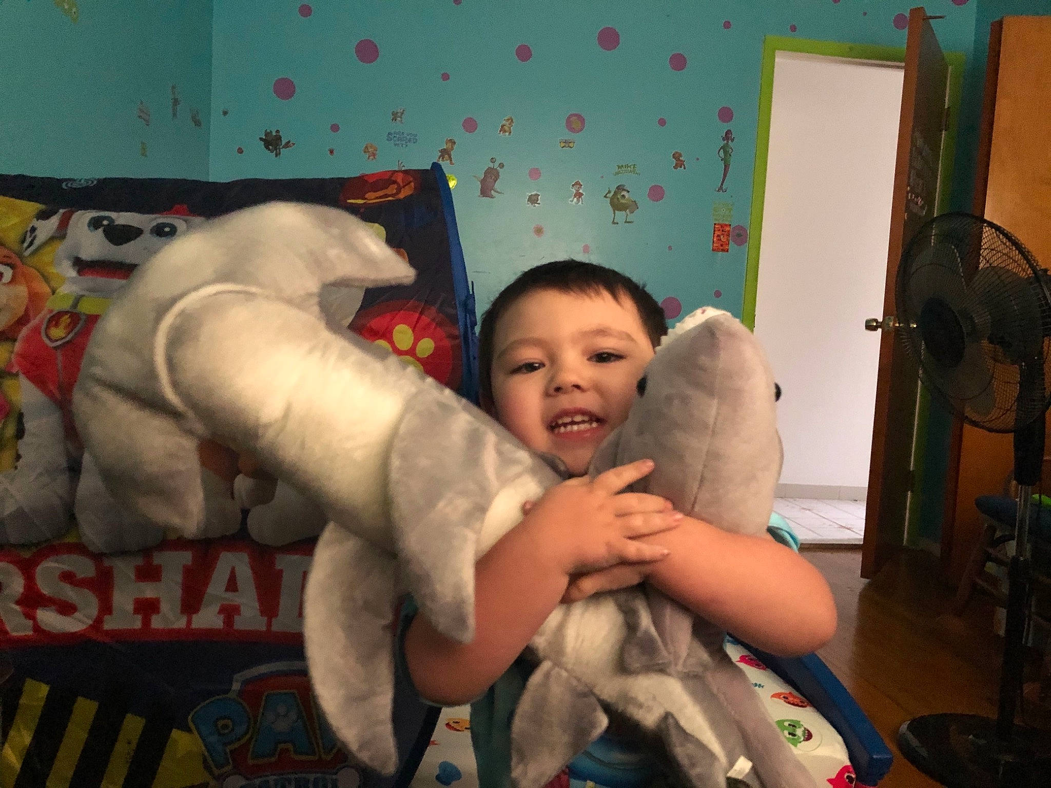 Christian is registered to the contest to win money with this photo: art, baby, child, event, flesh, fun, happy, holiday, leisure, mechanical_fan, person, play, room, smile, stuffed_toy, t_shirt, textile, toddler, toy, visual_arts