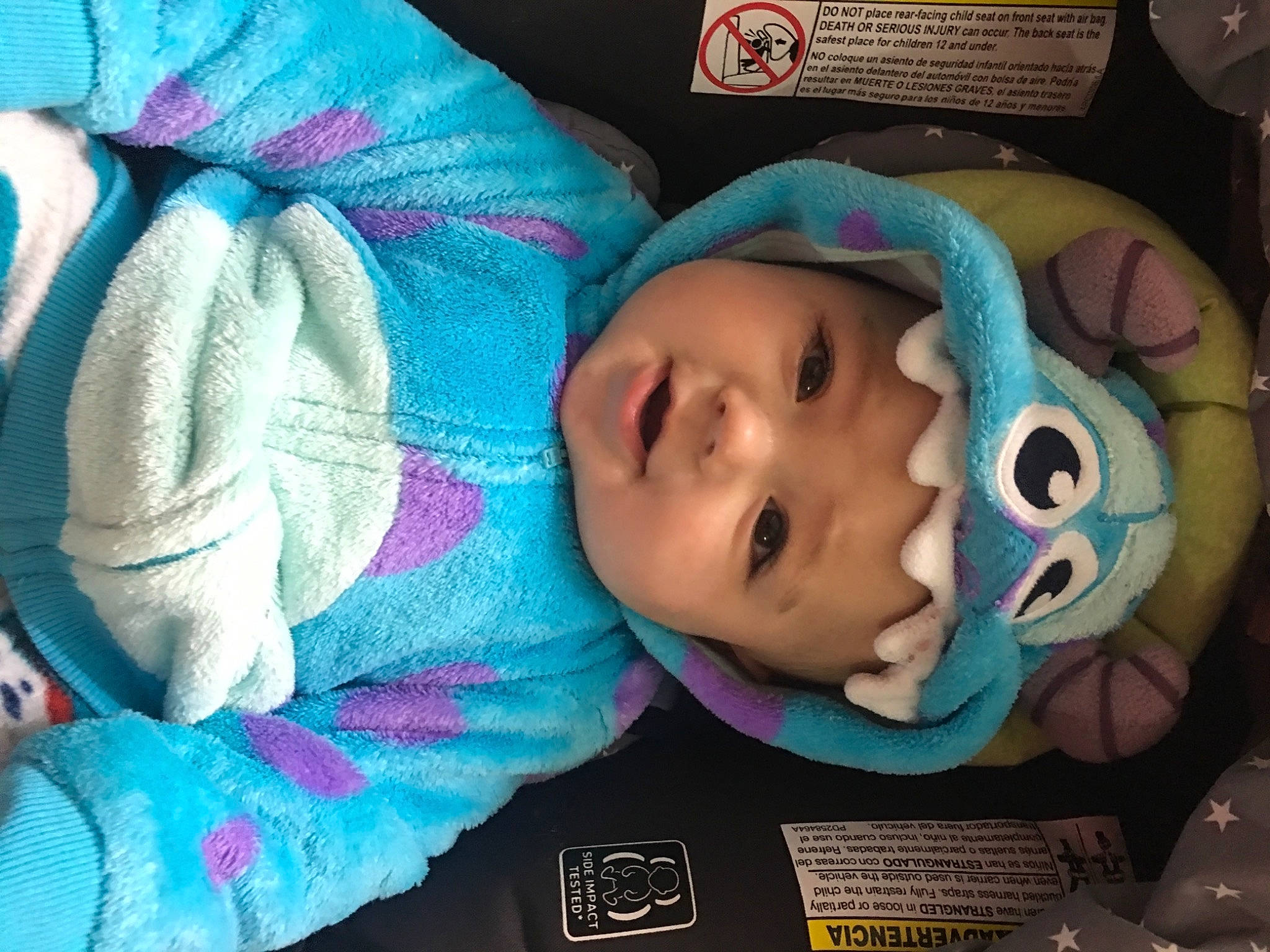 Christian is registered to the contest to win money with this photo: baby, baby_toddler_clothing, cheek, chin, eye, eyebrow, eyelash, face, facial_expression, head, headwear, human_body, iris, mammal, nose, organ, person, product, purple, skin