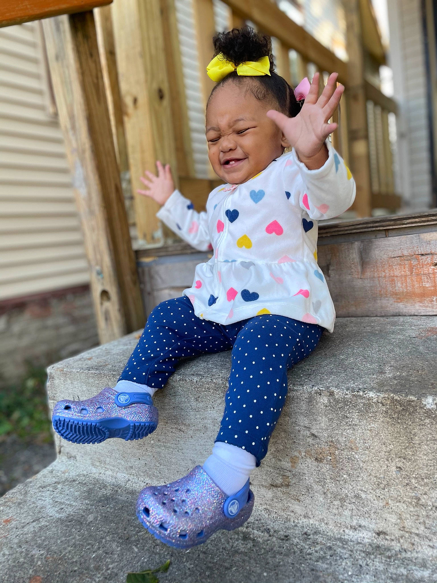 Dalayiah is registered to the contest to win money with this photo: baby_toddler_clothing, barefoot, electric_blue, foot, fun, grass, happy, hat, leisure, magenta, pattern, person, sitting, sleeve, smile, sock, street_fashion, sun_hat, textile, toddler