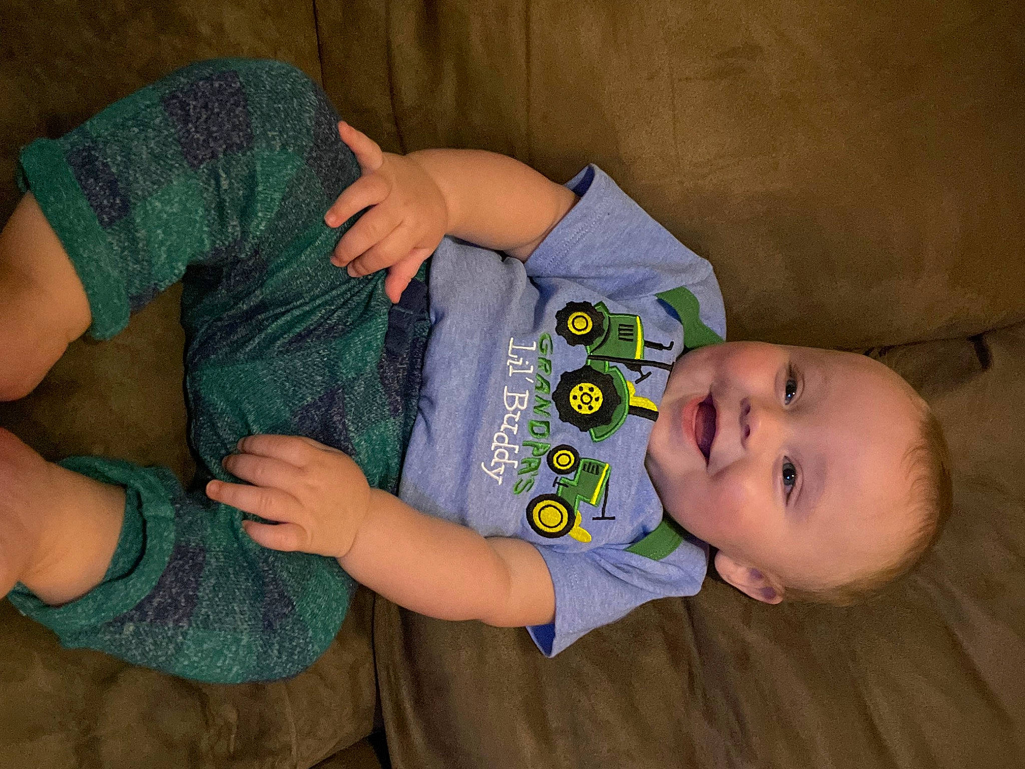 Devon is registered to the contest to win money with this photo: baby, baby_products, baby_toddler_clothing, cheek, child, comfort, eye, finger, hand, happy, head, headgear, human_body, iris, joy, person, sitting, skin, sleeve, smile