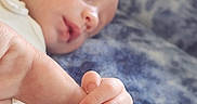 Joy joined the competition — help win amazing prizes! baby, sleeping, hand, finger, infant, closeup, skin, soft, peaceful, trust, warmth, bed, blanket, person, child, cute, tender, rest, young, holding