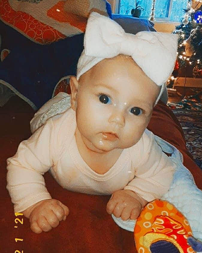 Lakynn is registered to the contest to win money with this photo: baby, baby_toddler_clothing, blue, cheek, child, chin, christmas_tree, costume_hat, event, eye, fun, happy, head, human_body, nose, ornament, person, product, skin, toddler