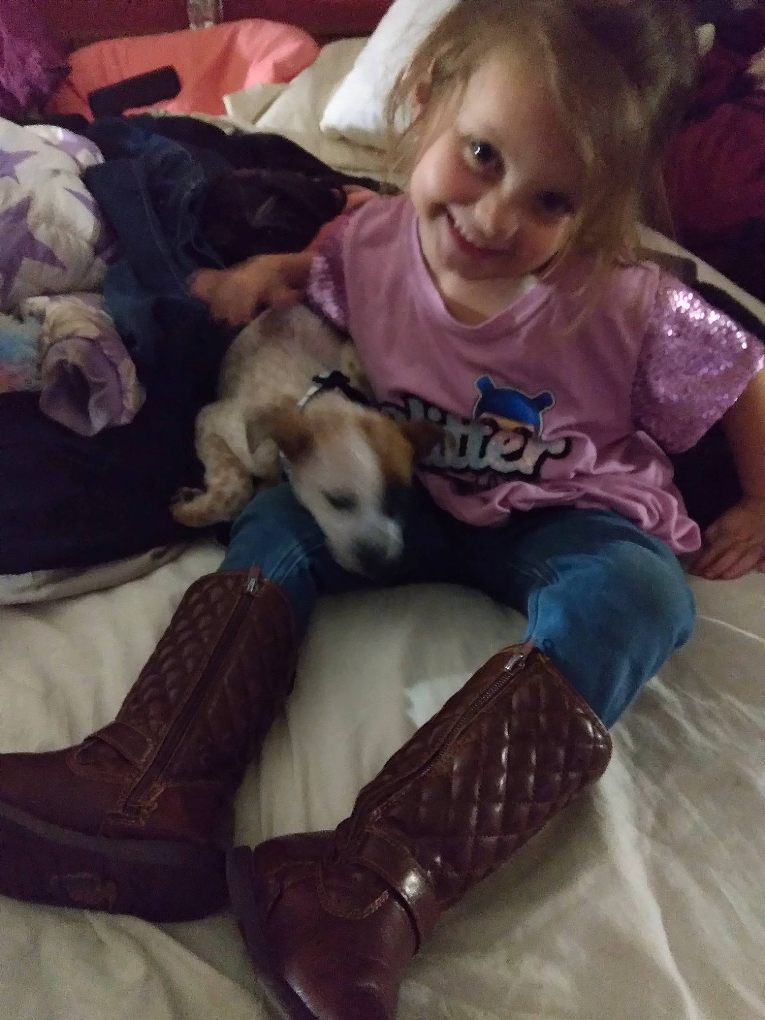 Addilynn is registered to the contest to win money with this photo: canidae, carnivore, child, comfort, companion_dog, dog, dog_breed, fawn, fun, fur, happy, human_leg, joy, knee, lap, person, sitting, smile, sporting_group, t_shirt