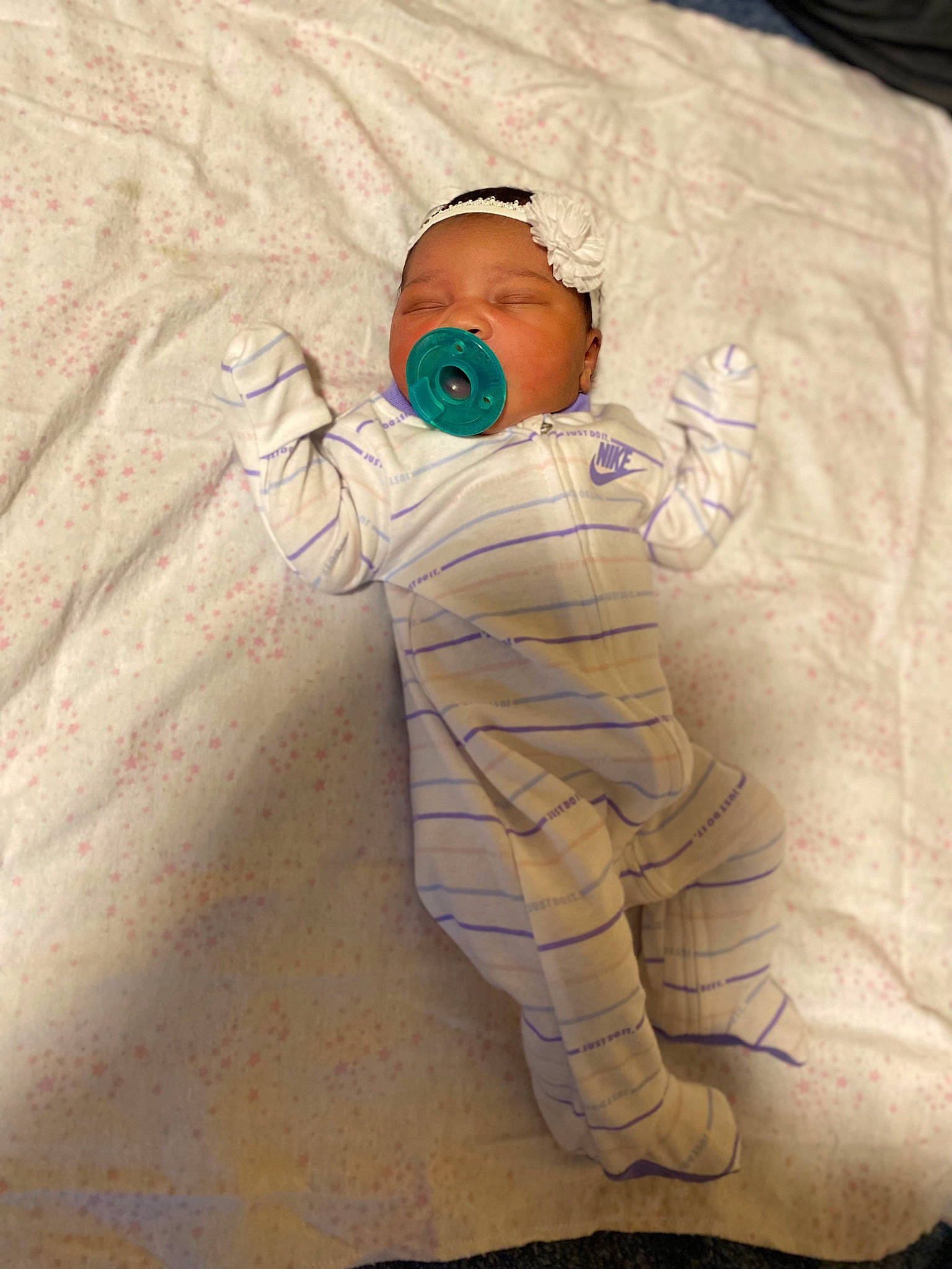 Khalani joined the competition — help win amazing prizes! baby, baby_toddler_clothing, bedding, bedtime, child, comfort, illustration, linens, person, personal_protective_equipment, sleeve, toddler, wood