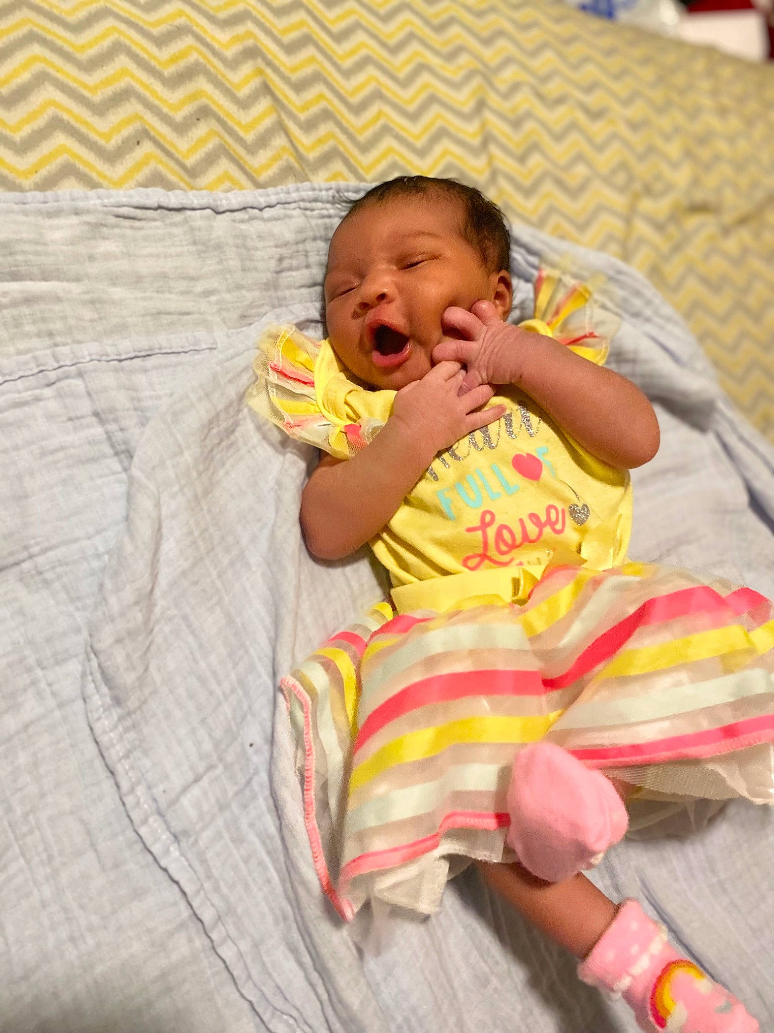 Khalani joined the competition — help win amazing prizes! baby, baby_products, baby_toddler_clothing, cheek, child, comfort, event, eye, face, finger, fun, happy, head, human_body, linens, person, pink, sitting, skin, thigh