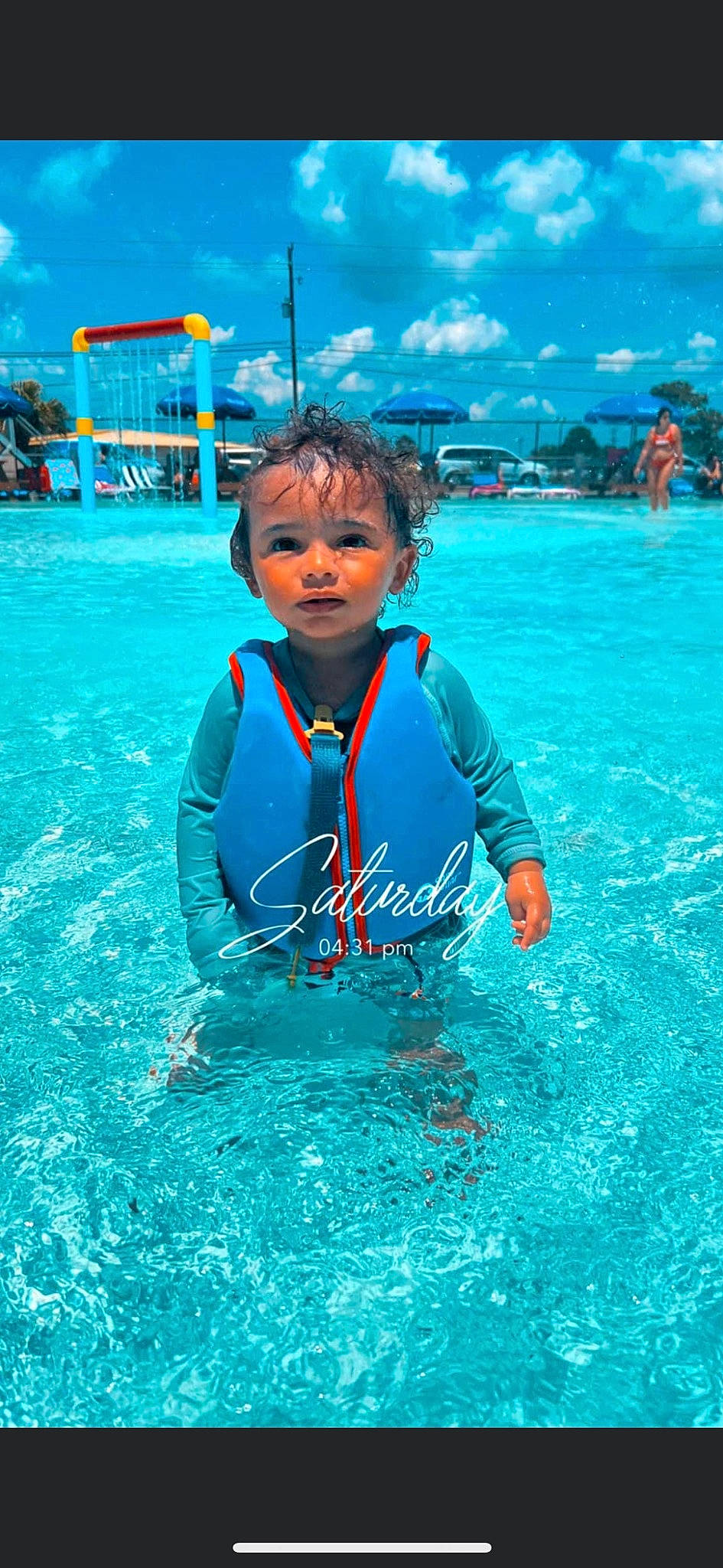 Zaiden joined the competition — help win amazing prizes! aqua, azure, blue, cloud, cool, electric_blue, fun, happy, leisure, people_on_beach, person, personal_protective_equipment, recreation, sky, summer, swimmer, swimming_pool, toddler, water, wave