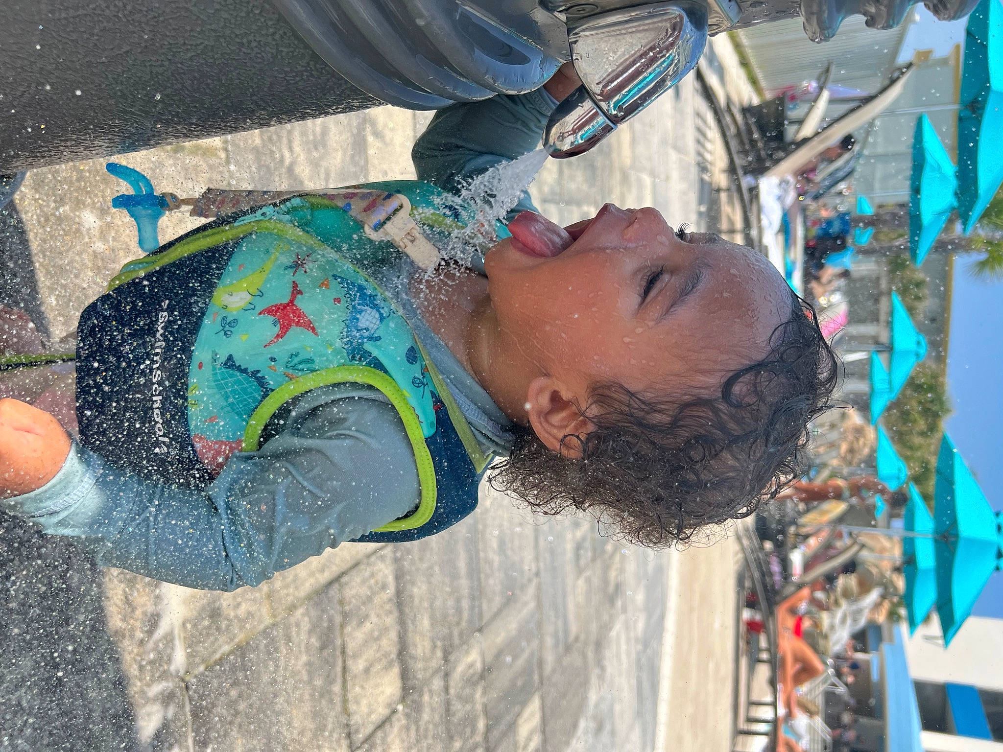 Zaiden is registered to the contest to win money with this photo: bicycle_wheel, blue, child, fun, leisure, person, personal_protective_equipment, recreation, soil, toddler, tree, water