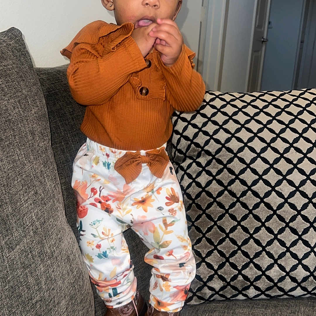 Avajames joined the competition — help win amazing prizes! architecture, baby, bodypart, clothing, coat, couch, cushion, face, finger, footwear, furniture, hand, head, homedecor, pants, person, photography, portrait, shoe, sitting