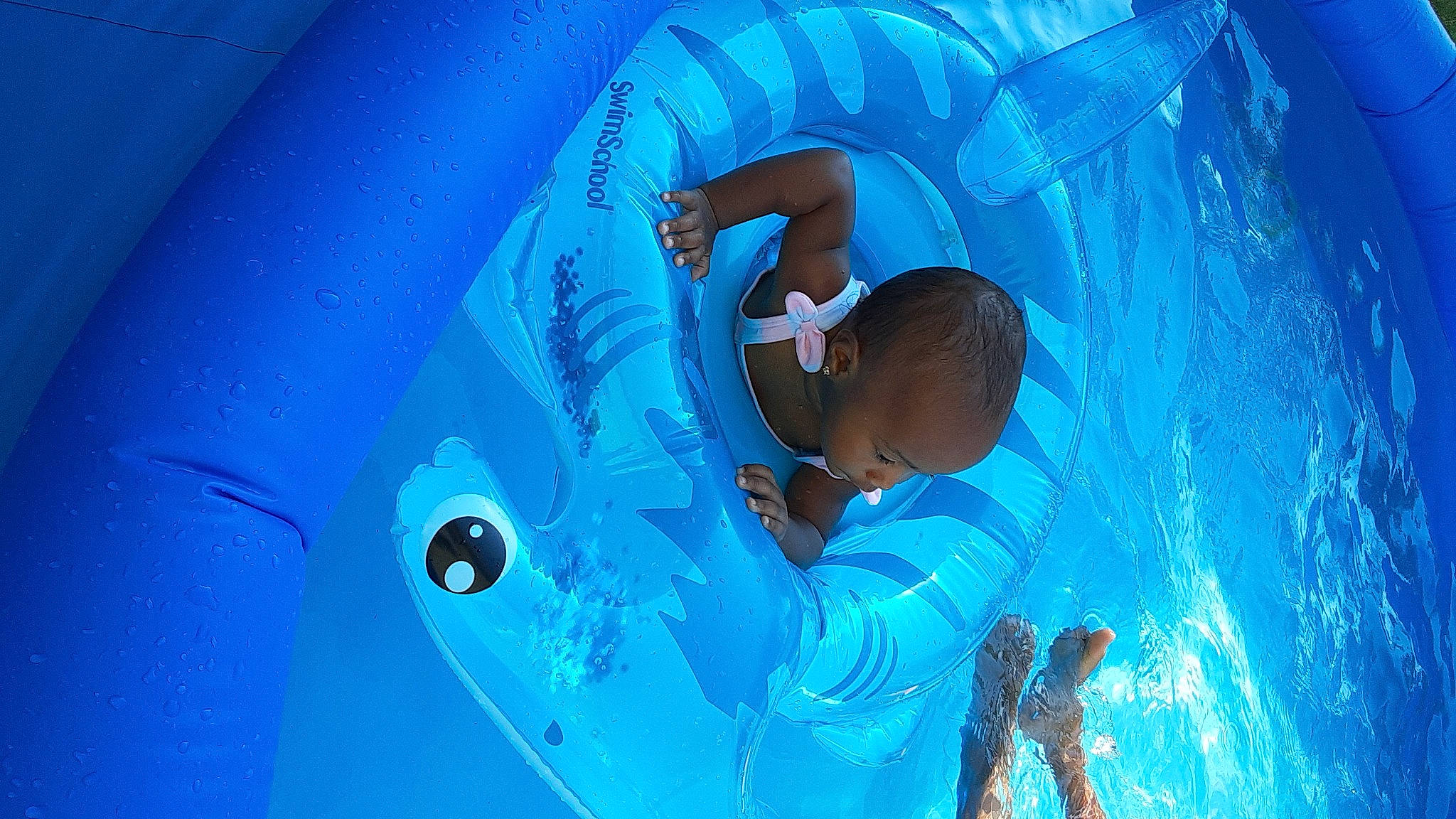 Kathryn joined the competition — help win amazing prizes! aqua, blue, child, circle, electric_blue, fun, games, happy, inflatable, leisure, person, personal_protective_equipment, plastic, recreation, swimming_pool, t_shirt, water, world