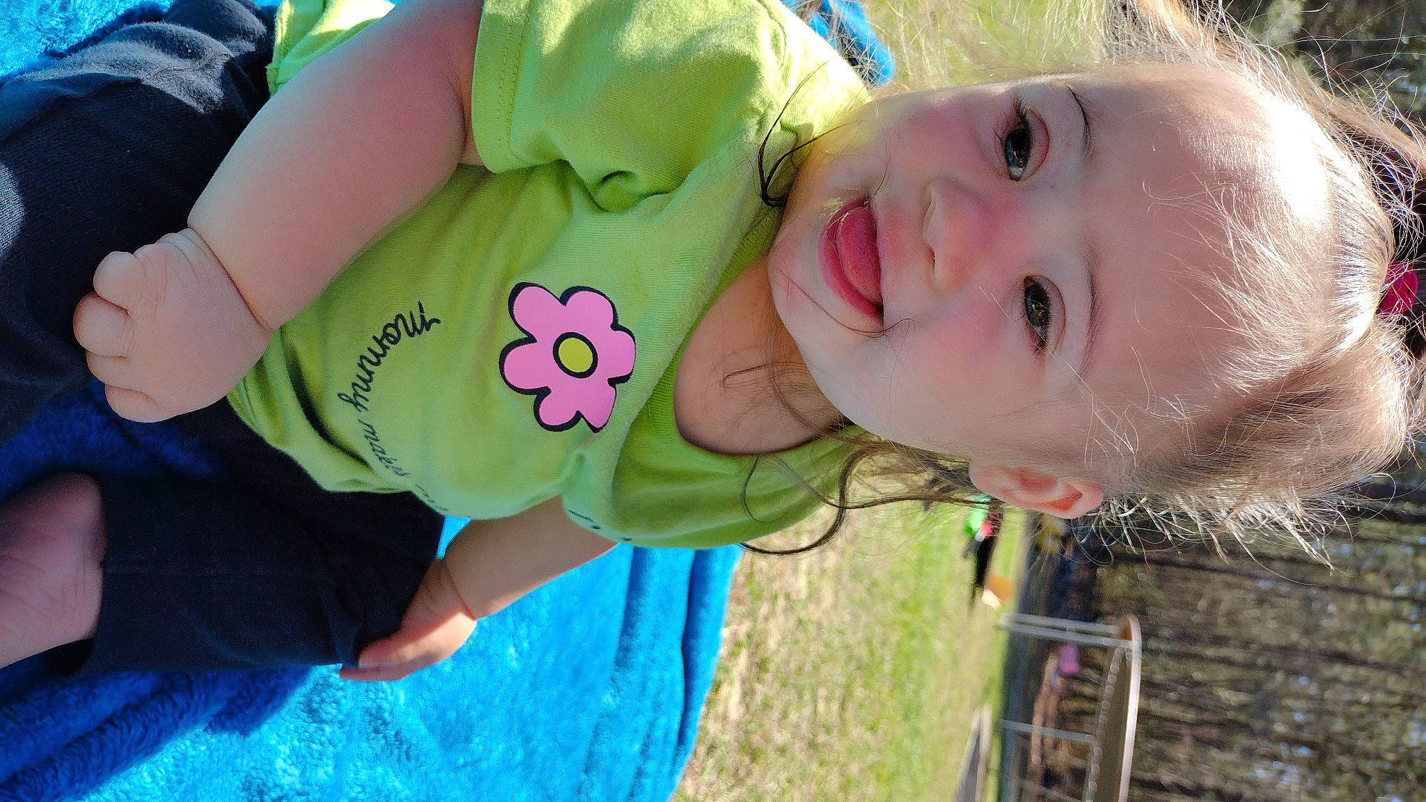 Aurora is registered to the contest to win money with this photo: baby_toddler_clothing, cool, facial_expression, fun, grass, green, happy, headgear, human, leisure, lip, mouth, nose, people_in_nature, person, pink, plant, skin, smile, summer