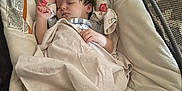 Layla joined the competition — help win amazing prizes! baby, sleeping, blanket, baby_seat, floral_pattern, infant, child, cute, cozy, indoors, resting, soft, toddler, peaceful, relaxed, portrait, person, head, hand, fabric