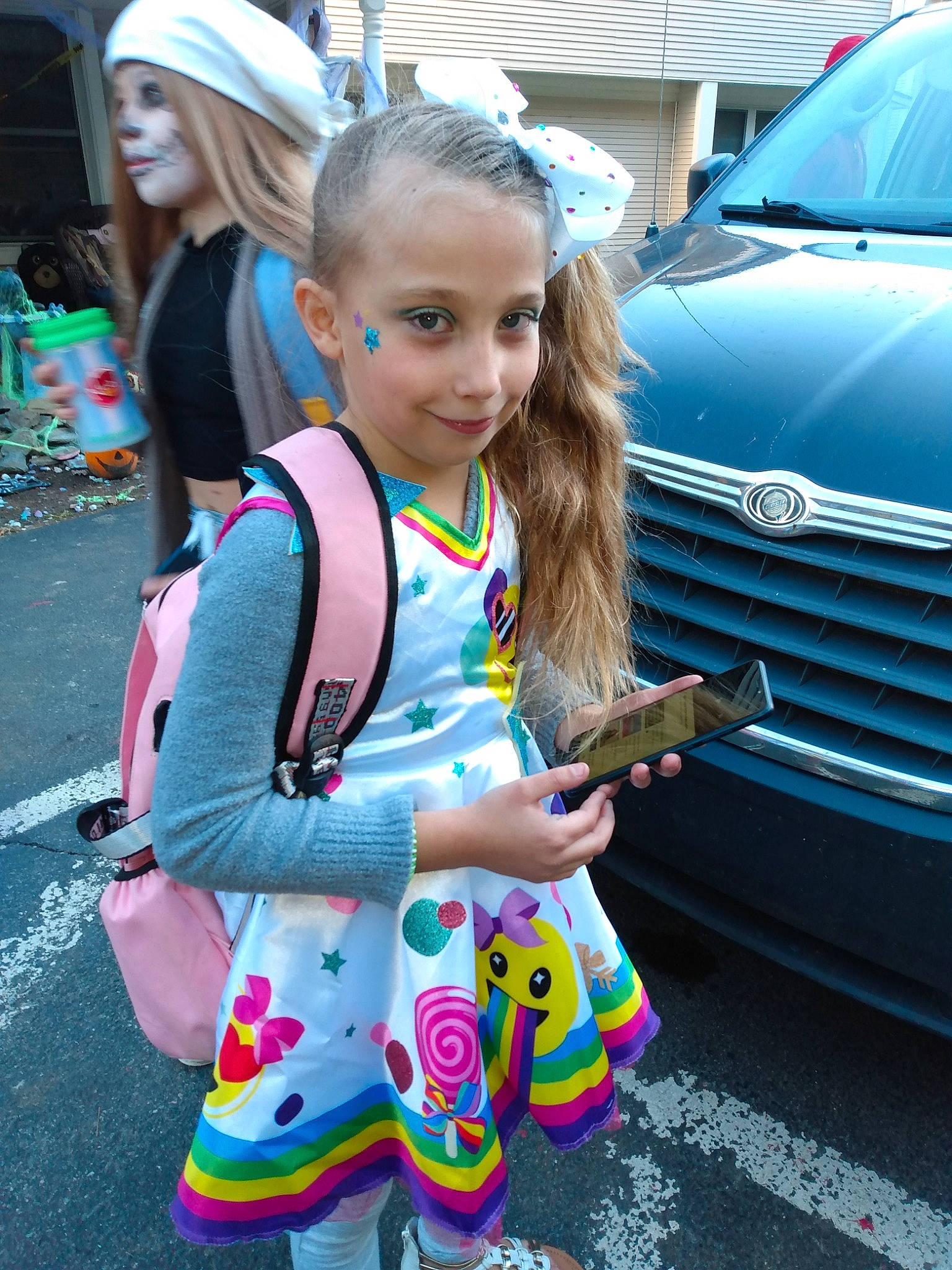 Raquel joined the competition — help win amazing prizes! automotive_design, automotive_exterior, automotive_lighting, bumper, car, fashion, grille, hair, head, headlamp, hood, joy, motor_vehicle, person, personal_luxury_car, product, public_space, standing, street_fashion, under_exposed