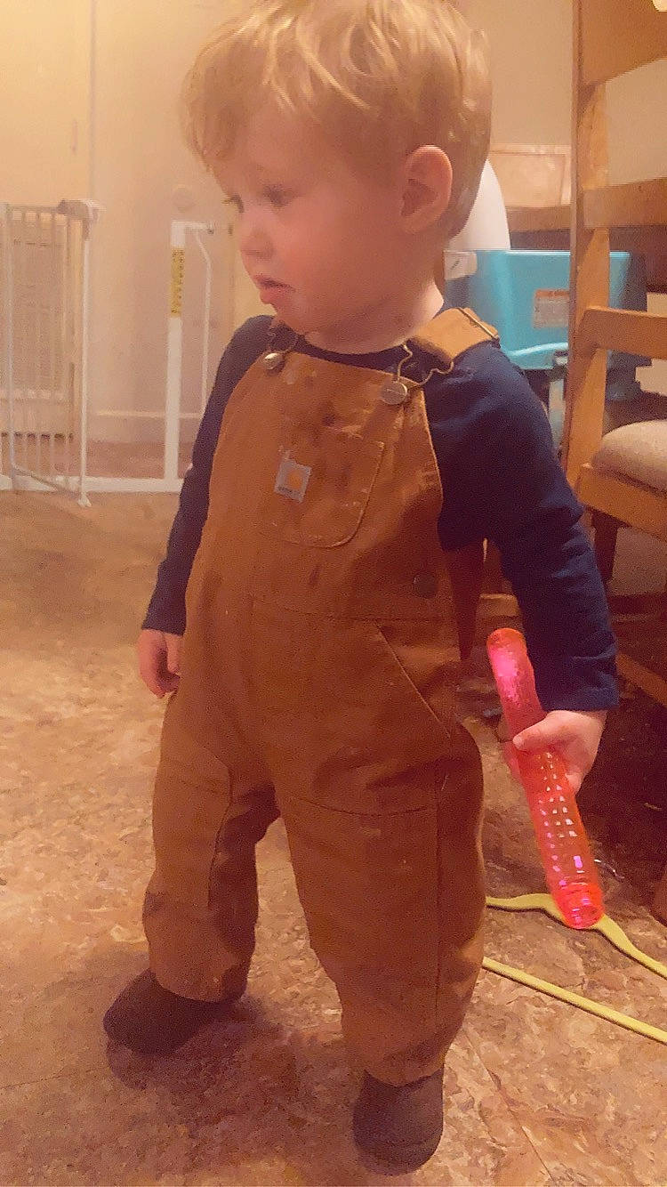 Laken is registered to the contest to win money with this photo: baby, baby_toddler_clothing, chair, cheek, child, floor, flooring, fun, hardwood, nose, orange, peach, person, pink, sitting, skin, sleeve, standing, toddler, toy