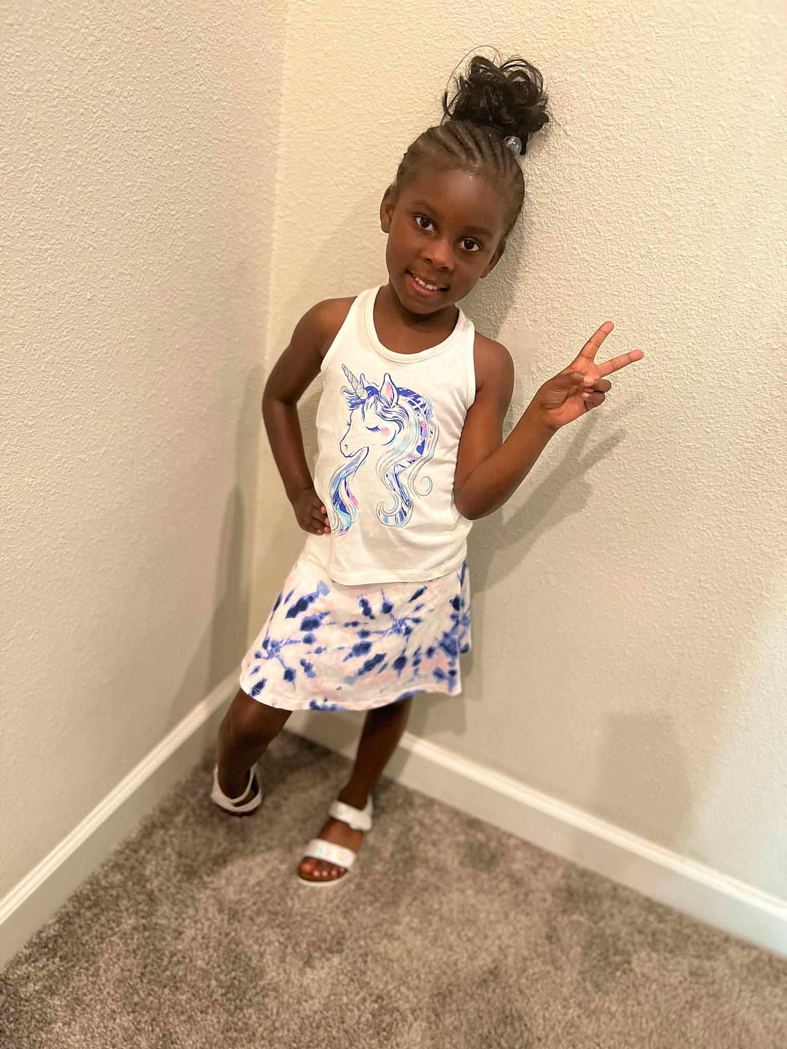 Kennedi is registered to the contest to win money with this photo: arm, baby_toddler_clothing, black_hair, elbow, electric_blue, fashion_design, happy, human_leg, joint, joy, knee, leg, neck, person, sandal, shoulder, sleeve, smile, standing, t_shirt