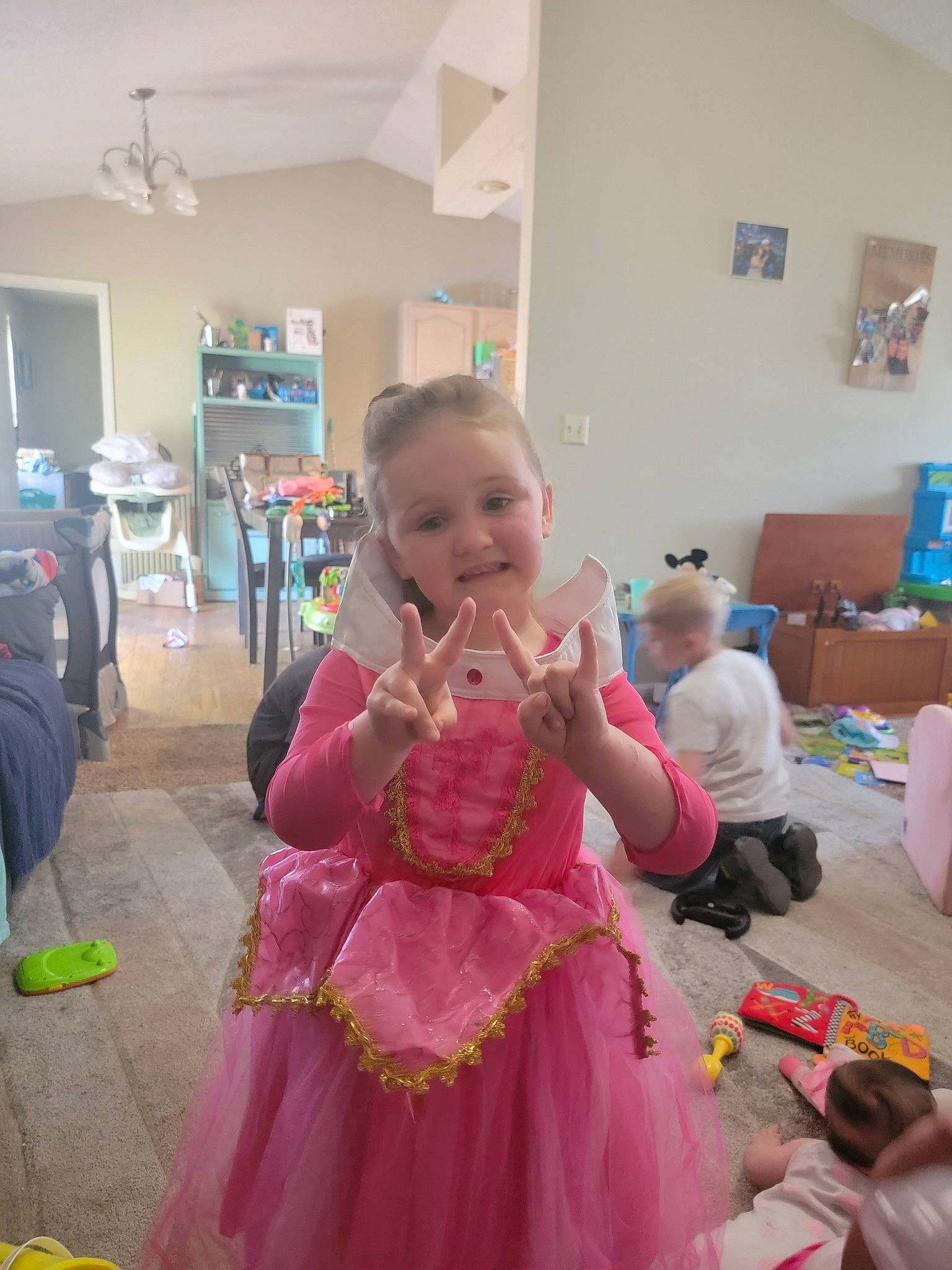 Emberlynn joined the competition — help win amazing prizes! baby, baby_toddler_clothing, chair, child, couch, door, event, flooring, fun, happy, magenta, party, person, picture_frame, play, room, sitting, smile, toddler