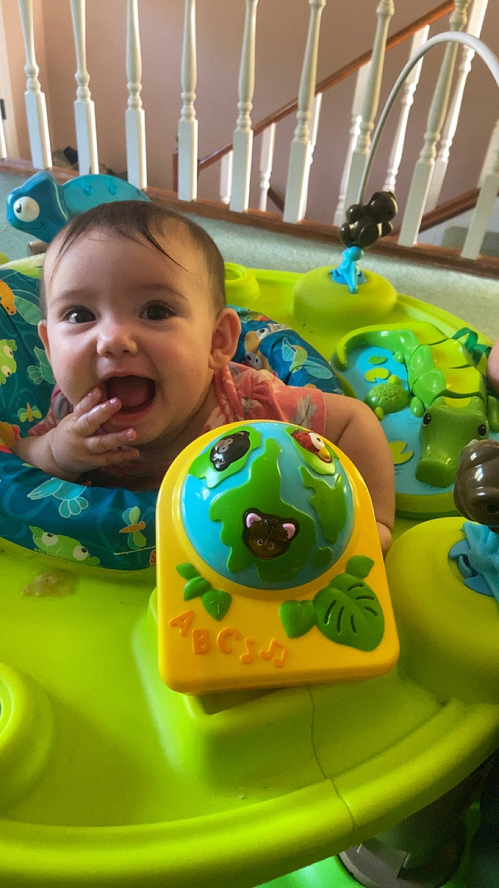 Reina is registered to the contest to win money with this photo: baby, baby_playing_with_toys, baby_products, baby_toddler_clothing, baby_toys, blue, cheek, child, fence, fun, green, happy, laugh, leisure, person, play, recreation, room, smile, toddler