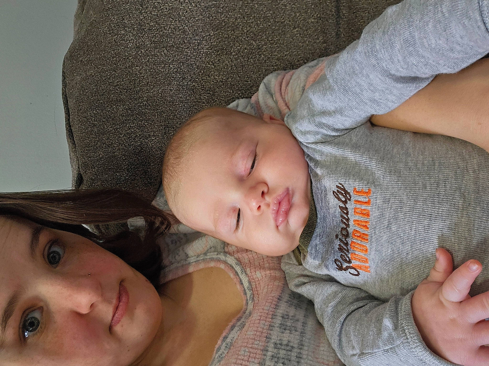 Waylon is registered to the contest to win money with this photo: baby, baby_toddler_clothing, cheek, child, chin, comfort, eye, eyelash, finger, forehead, hand, human_body, lip, mouth, nose, organ, person, skin, toddler, tree