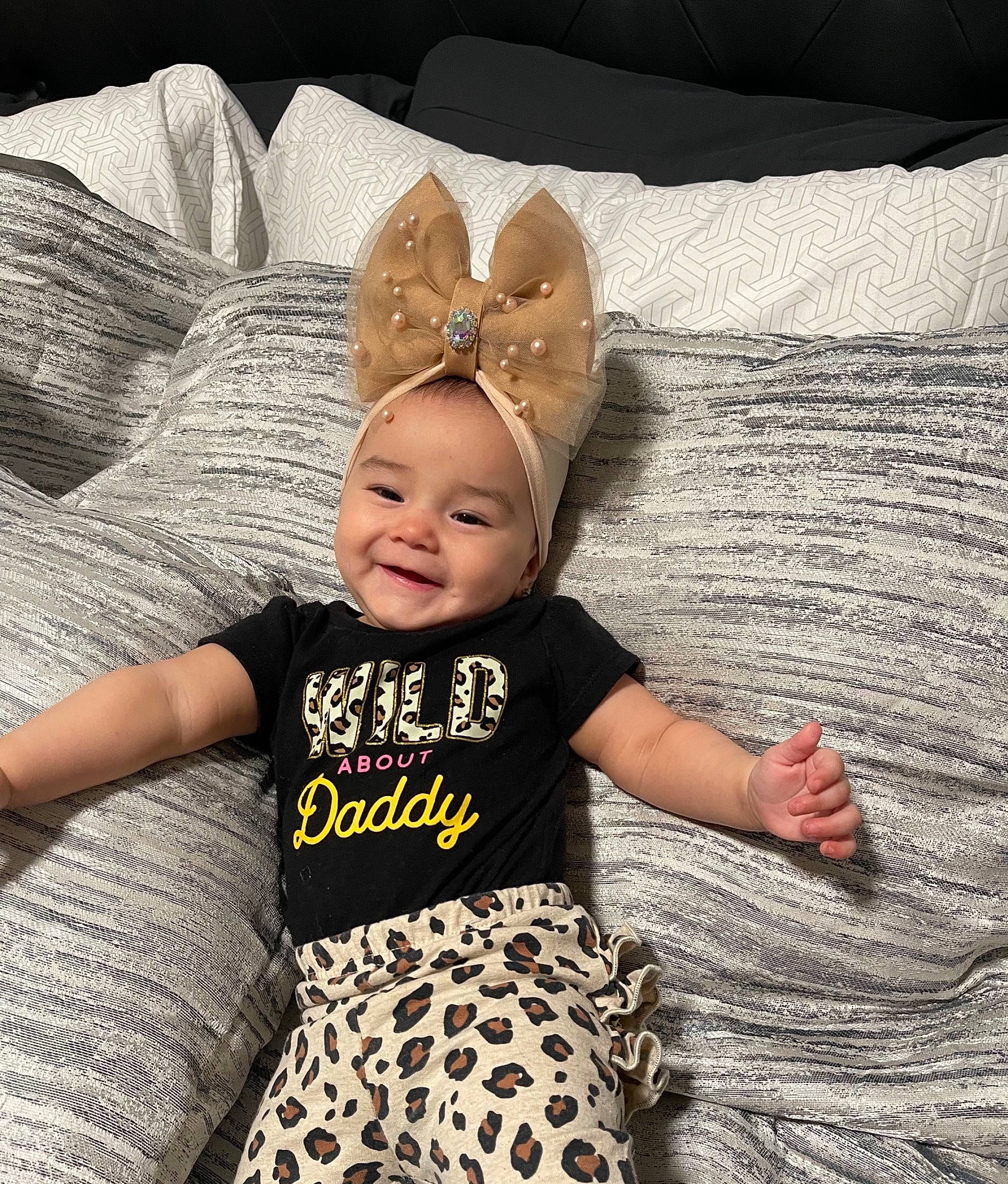 Ariela joined the competition — help win amazing prizes! baby, baby_toddler_clothing, cap, child, comfort, cool, costume_hat, flooring, fun, grass, happy, headgear, joy, pattern, person, skin, sleeve, smile, t_shirt, textile