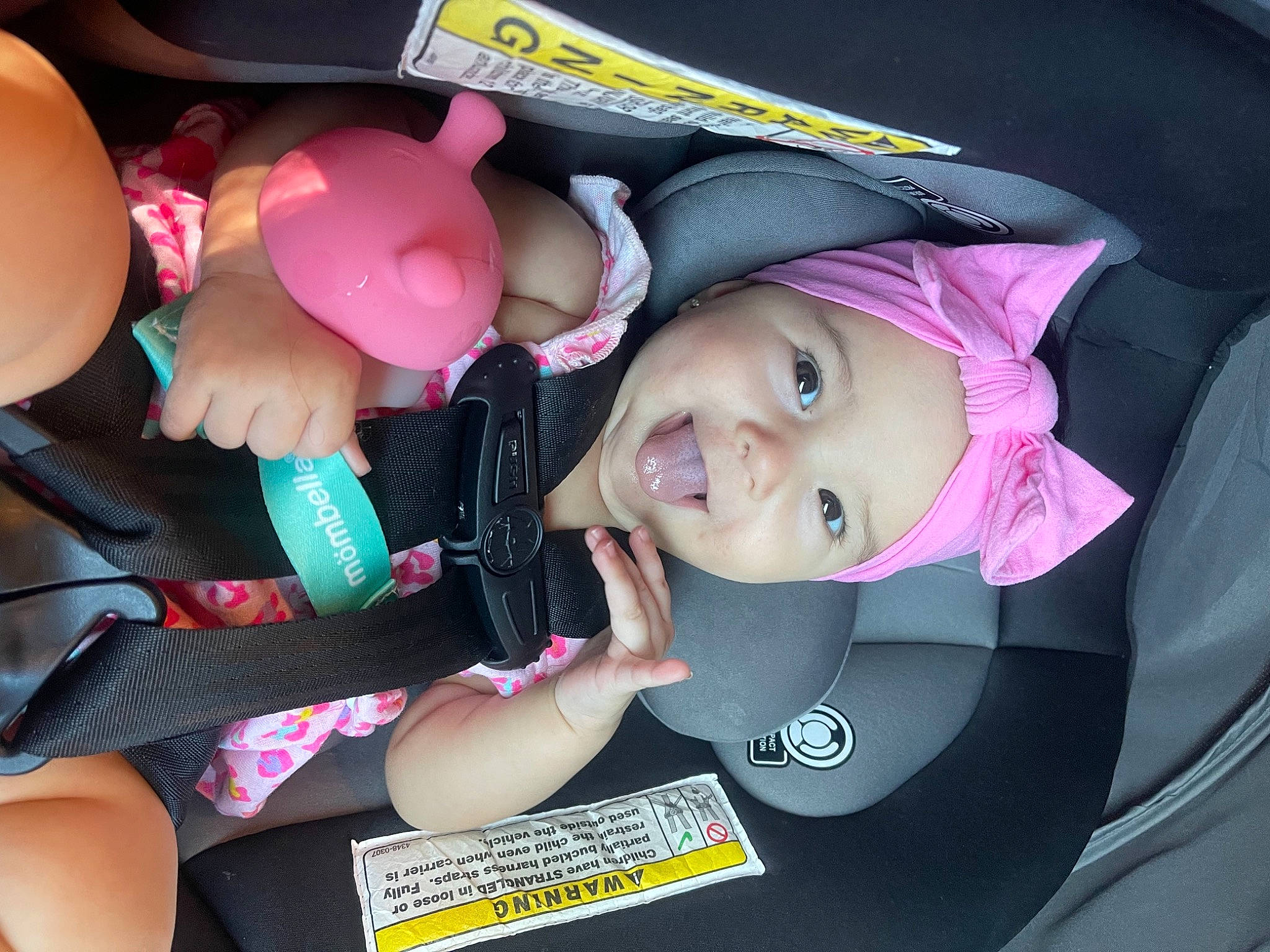 Ariela is registered to the contest to win money with this photo: auto_part, automotive_wheel_system, baby_carriage, baby_products, balloon, car_seat, child, event, eye, fun, happy, headwear, magenta, material_property, nail, person, pink, product, skin, smile
