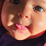 Ayla joined the competition — help win amazing prizes! baby, close_up, face, tongue, skin, eyes, child, infant, expression, cute, natural_light, soft_skin, portrait, young, adorable, mouth, cheeks, clothing, human, person