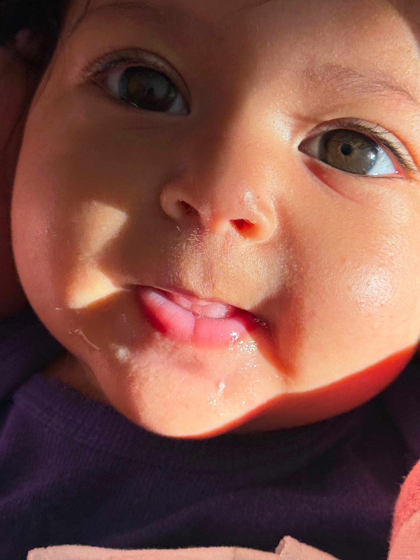 Ayla joined the competition — help win amazing prizes! baby, close_up, face, tongue, skin, eyes, child, infant, expression, cute, natural_light, soft_skin, portrait, young, adorable, mouth, cheeks, clothing, human, person