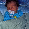 Mikah is registered to the contest to win money with this photo: baby, pacifier, blanket, sleeping, infant, blue_onesie, hair, spiky_hair, cozy, bed, child, face, closed_eyes, cute, newborn, soft_lighting, indoors, resting, toddler, wrapped