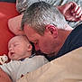 Nathan a rejoint le concours — aidez-le/la à gagner de superbes lots ! baby, infant, father, adult, sleeping, nap, bed, blanket, pillow, pacifier, hand, head, hair, skin, cozy, indoors, family, bonding, closeup, portrait