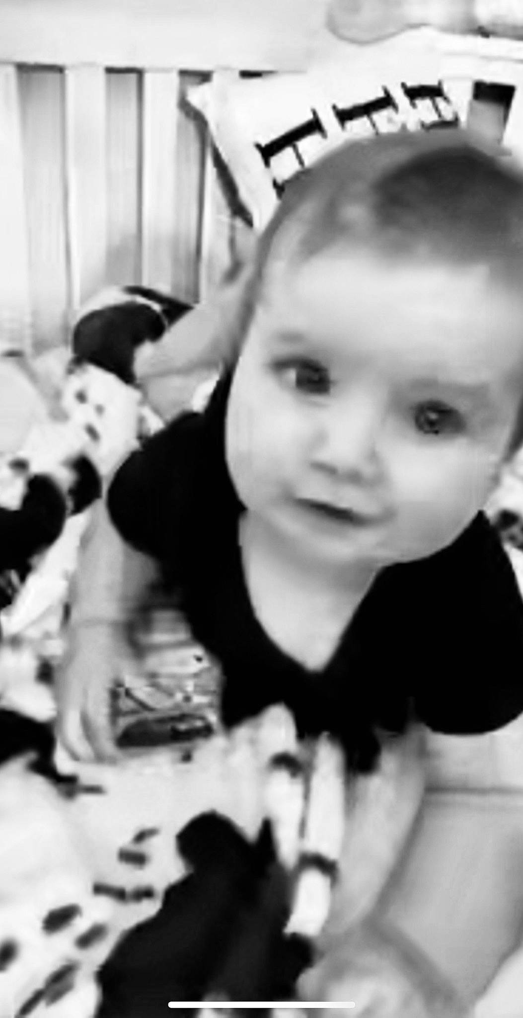 Athena is registered to the contest to win money with this photo: baby, baby_toddler_clothing, black, black_and_white, cheek, child, ear, eyebrow, eyelash, fun, happy, iris, monochrome, monochrome_photography, person, room, sitting, smile, style, t_shirt