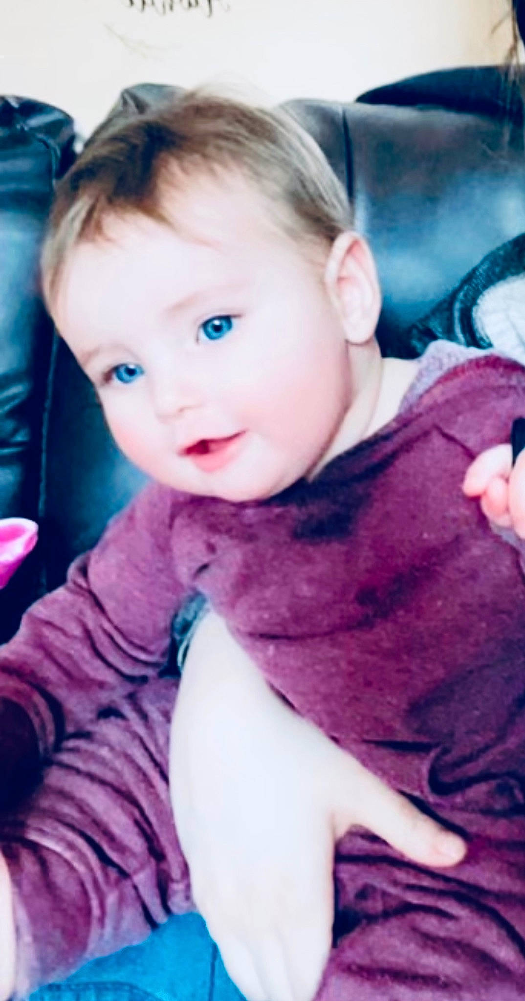 Athena is registered to the contest to win money with this photo: baby, baby_toddler_clothing, cheek, child, comfort, cool, ear, eyelash, hair, hairstyle, happy, iris, lip, nose, person, pink, purple, skin, sleeve, smile