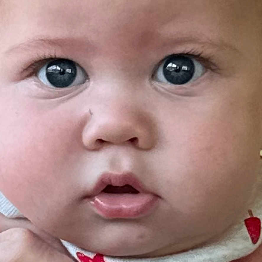 Easton joined the competition — help win amazing prizes! baby, blue_eyes, child, close_up, cute, expression, face, hands, holding, human, infant, intimate, mouth_open, newborn, person, plump_cheeks, portrait, red_stars, skin, white_clothing