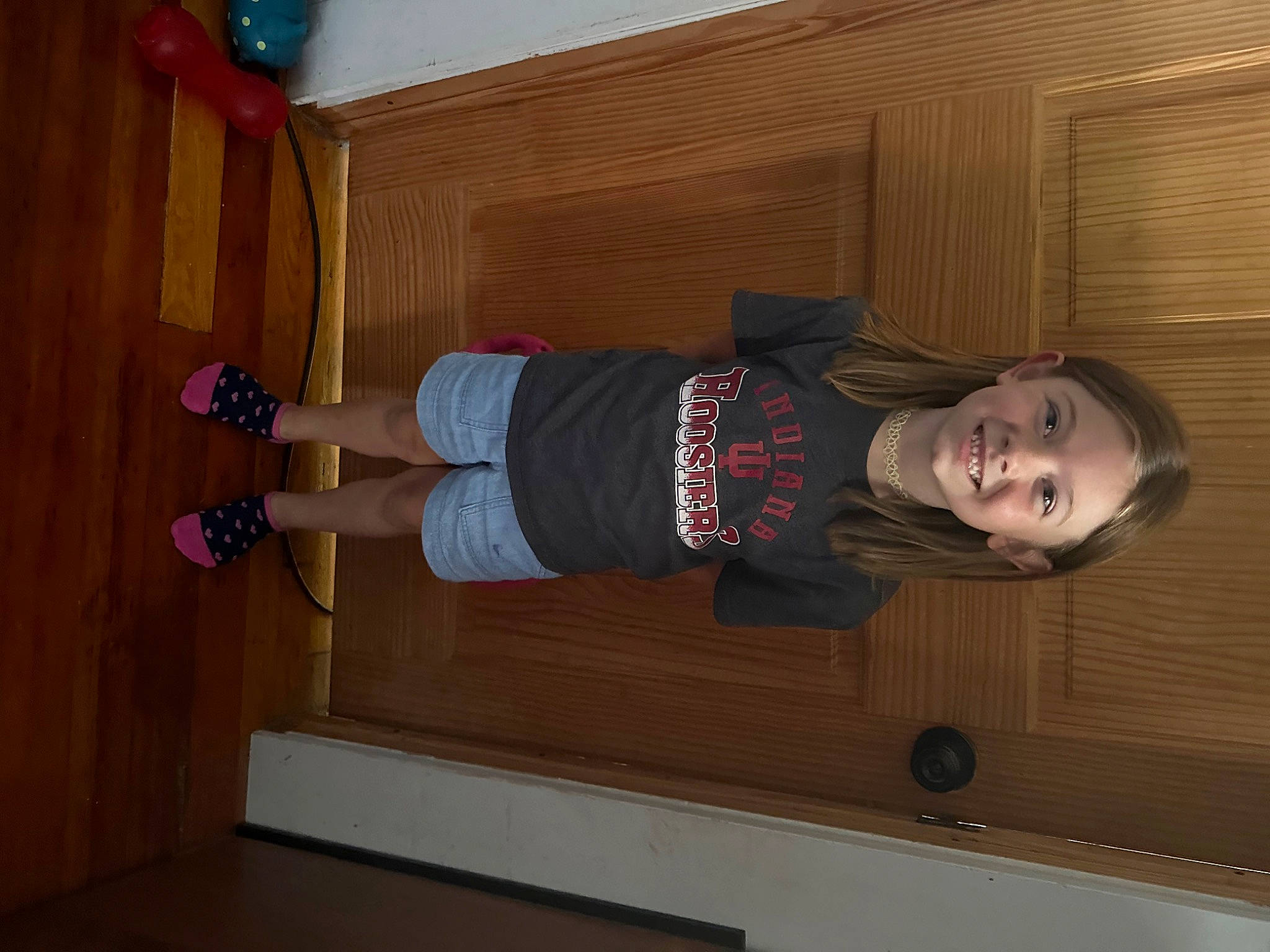 Zoey is registered to the contest to win money with this photo: child, dress, floor, flooring, fun, hardwood, hat, joy, laminate_flooring, person, plywood, room, shoe, sleeve, smile, standing, thigh, toddler, varnish, wood