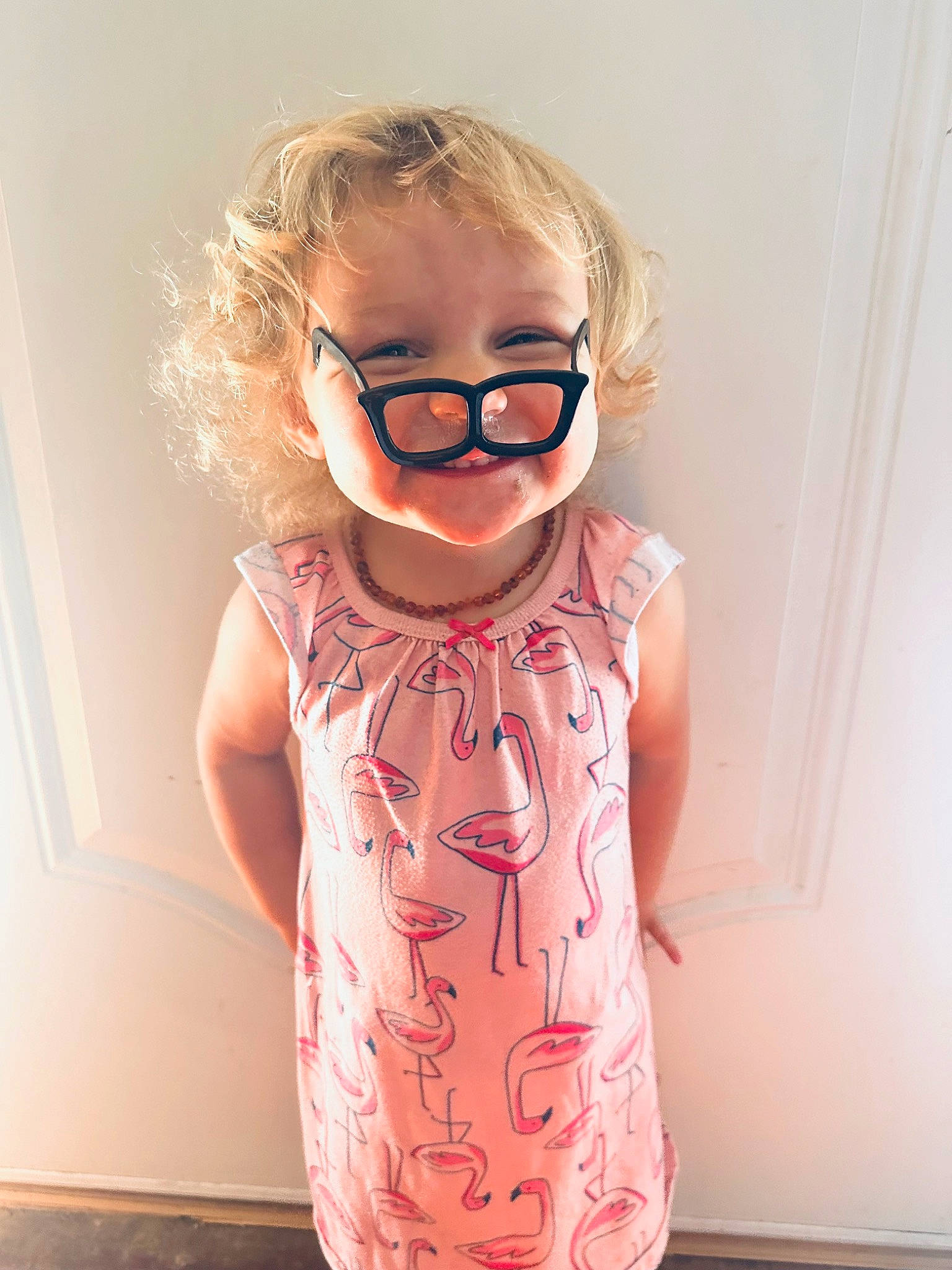 Laken is registered to the contest to win money with this photo: baby_toddler_clothing, child, clothing, dress, eyelash, eyewear, fashion_accessory, glasses, goggles, happy, lip, neck, pattern, person, personal_protective_equipment, shoulder, sleeve, sunglasses, t_shirt, toddler
