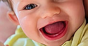 Callie joined the competition — help win amazing prizes! arms, baby, child, close_up, cute, eyes, face, hands, happy, headshot, indoor, infant, joyful, laughing, open_mouth, photography, portrait, smiling, yellow_clothing, young_child