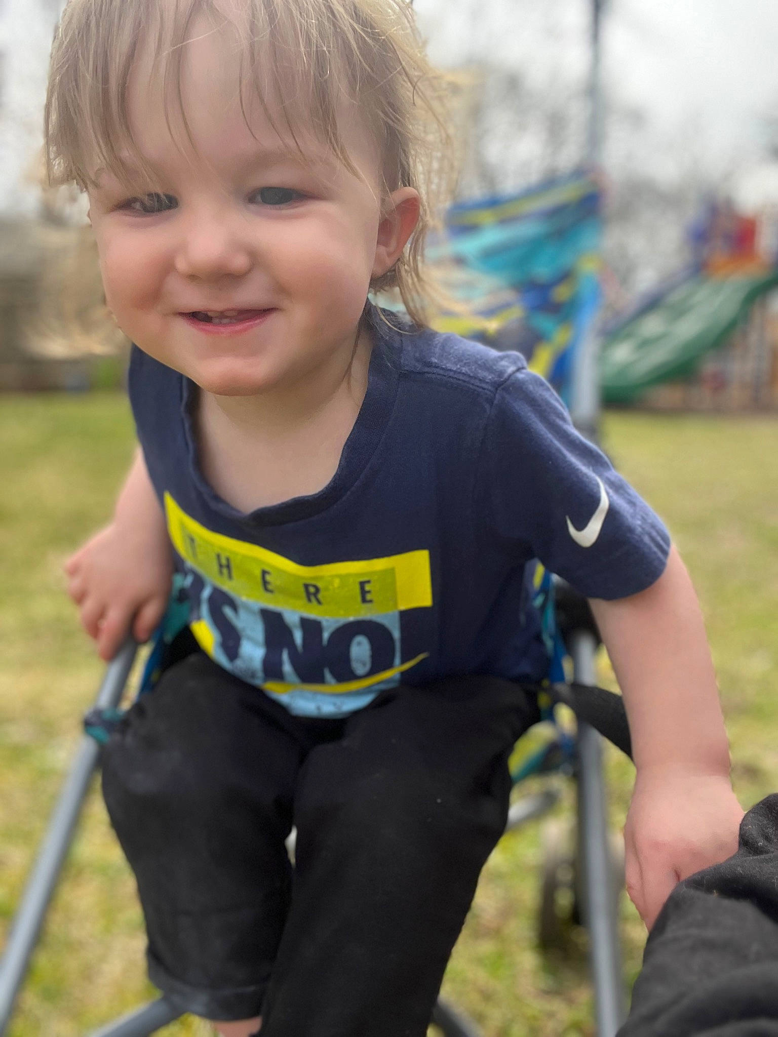 Kason joined the competition — help win amazing prizes! baby_toddler_clothing, blond, child, electric_blue, facial_expression, fun, grass, happy, joy, leisure, people_in_nature, person, personal_protective_equipment, play, recreation, sitting, sleeve, smile, standing, t_shirt