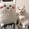 Snowy joined the competition — help win amazing prizes! cat, plush_toy, white_cat, stuffed_animal, blanket, indoors, pet, cute, soft, cozy, feline, companion, toy, animal, resting, domestic, fur, whiskers, ears, pink_nose