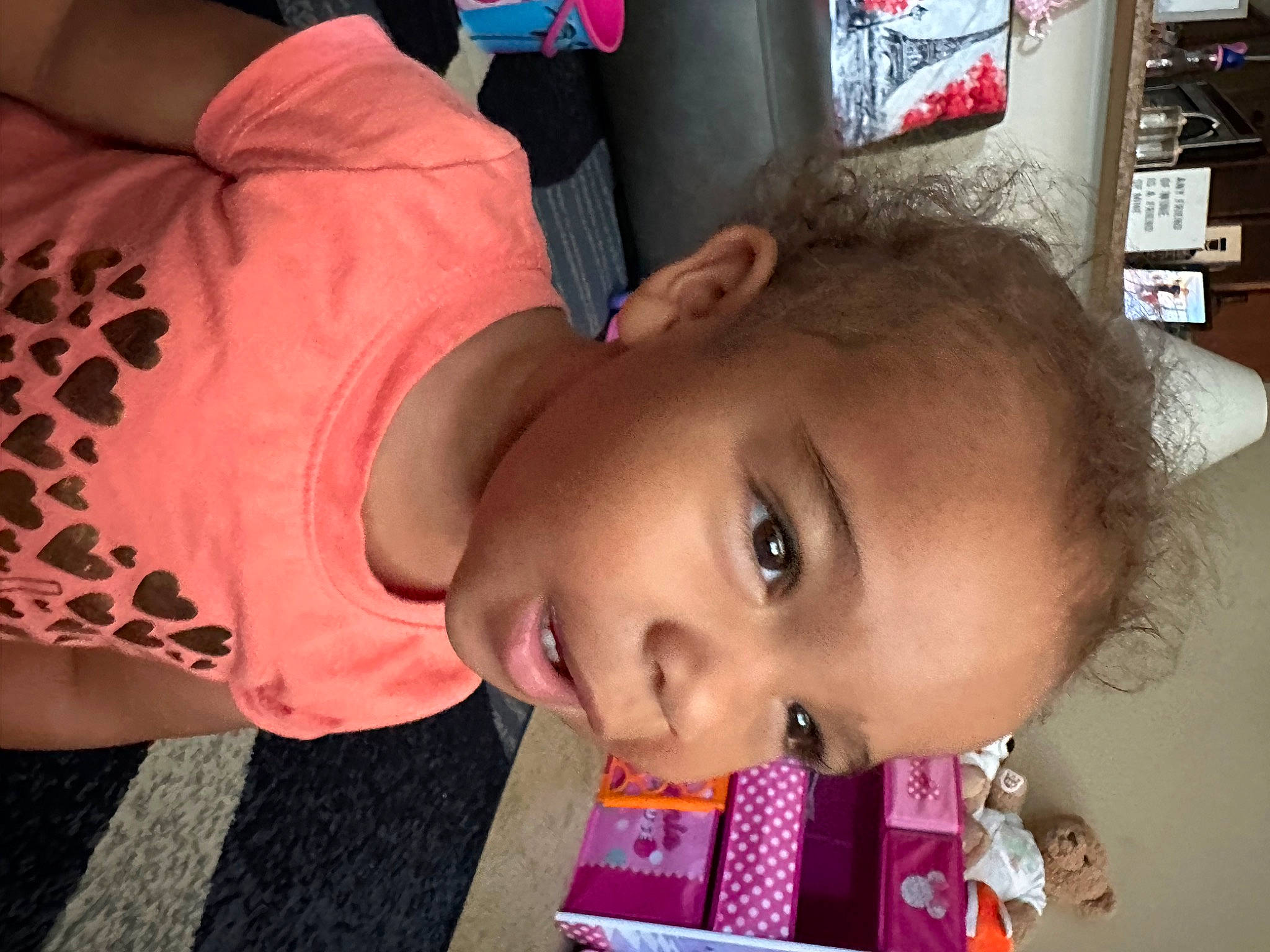 Cali joined the competition — help win amazing prizes! baby, baby_toddler_clothing, cheek, child, ear, eyelash, fun, hairstyle, happy, lip, magenta, mouth, nose, pattern, person, room, skin, sleeve, smile, toddler