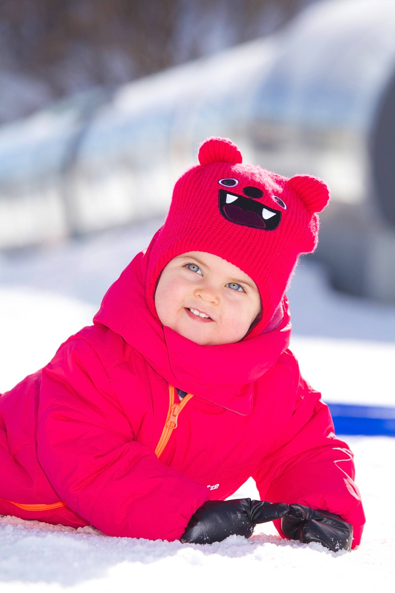Kélya participe au concours pour gagner de l'argent avec cette photo : baby, baby_toddler_clothing, cap, freezing, fun, happy, headwear, hood, human_body, joy, knit_cap, leisure, magenta, outdoor_recreation, parka, person, recreation, red, sleeve, smile