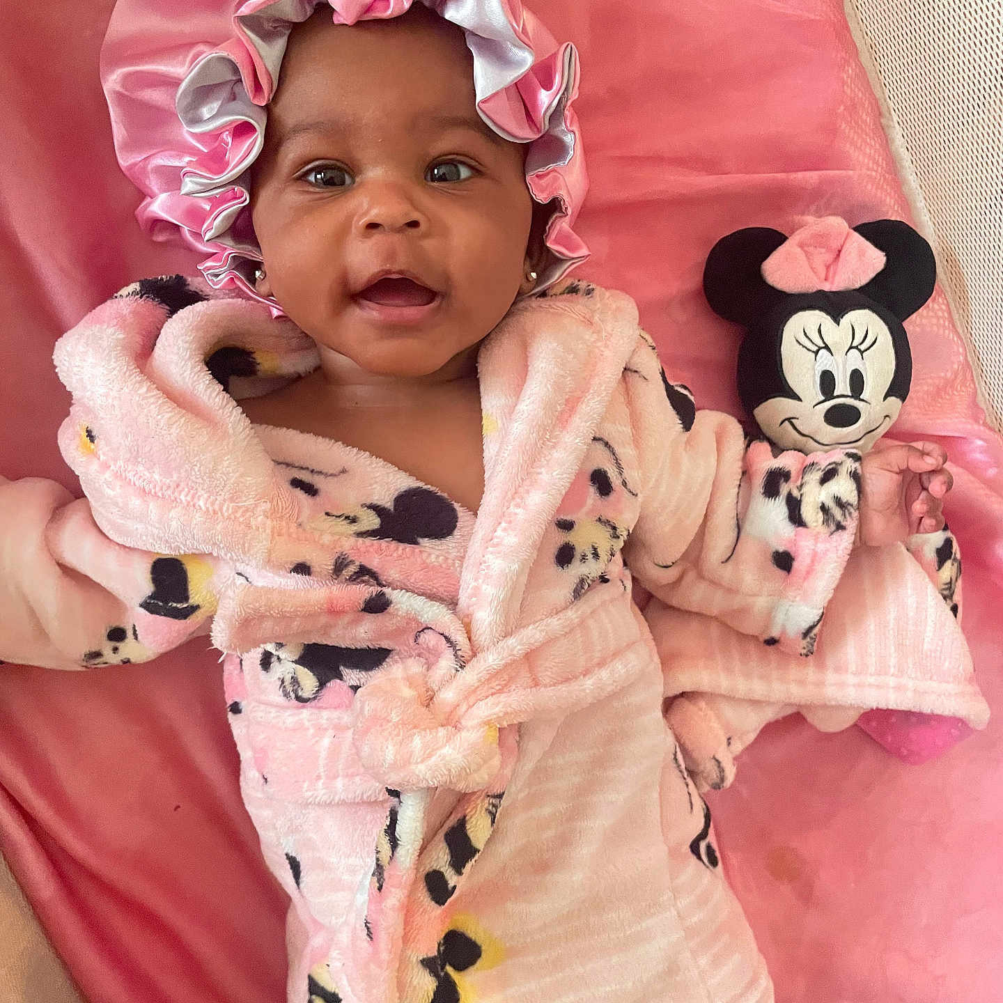 Avanoelle is registered to the contest to win money with this photo: baby, bed, bodypart, bonnet, cap, clothing, crib, dress, face, finger, furniture, happy, hat, head, infantbed, newborn, person, photography, portrait, smile