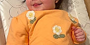Ellie is registered to the contest to win money with this photo: baby, bed, bodypart, clothing, crib, cushion, face, finger, furniture, hand, head, homedecor, infantbed, knitwear, longsleeve, person, photography, portrait, sleeve, sweater
