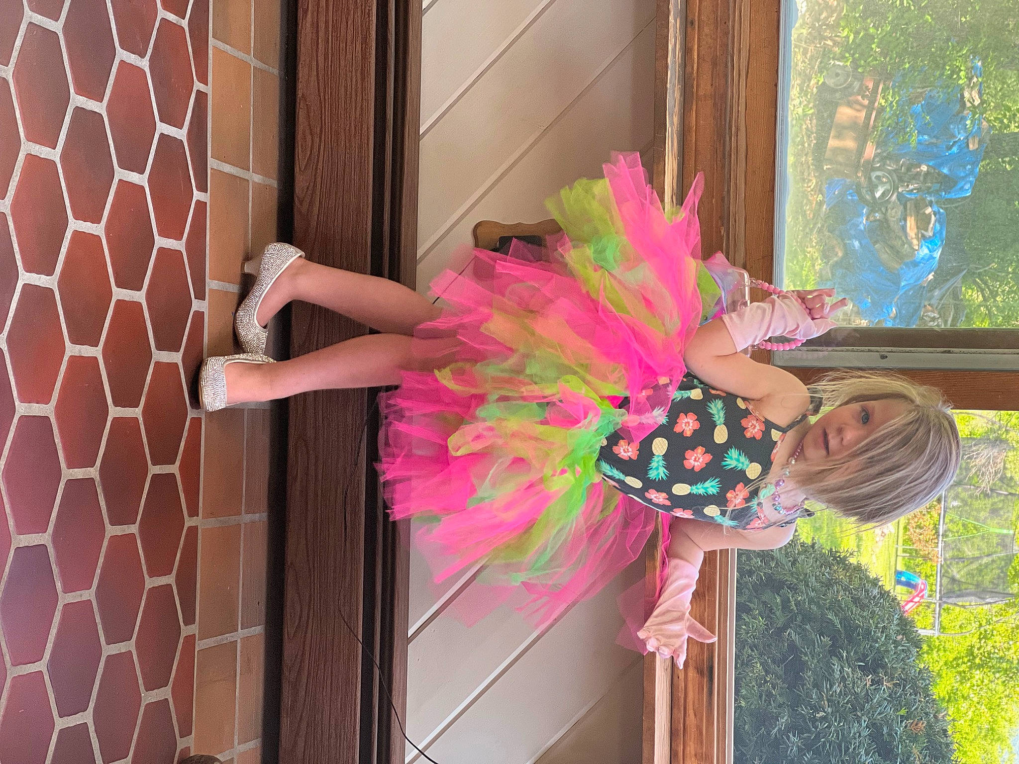 Jacqueline is registered to the contest to win money with this photo: costume, dress, entertainment, event, fashion_accessory, feather, fun, happy, magenta, natural_material, party_supply, peach, person, pink, plant, purple, red, textile, toy, tree