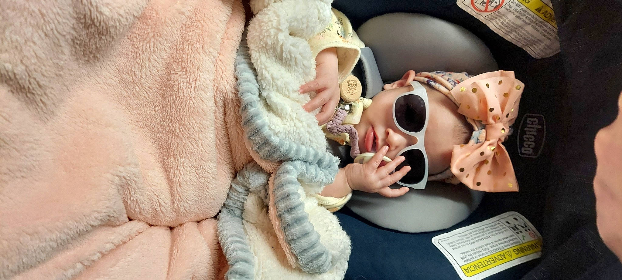 Rayna joined the competition — help win amazing prizes! arm, baby, baby_sleeping, baby_toddler_clothing, child, comfort, ear, eyelash, eyewear, finger, fur, glasses, linens, nail, pattern, person, skin, stuffed_toy, sunglasses, textile