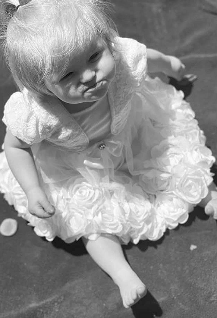 Kaylee joined the competition — help win amazing prizes! baby, baby_toddler_clothing, black_and_white, blond, child, dress, event, flash_photography, flooring, fun, gesture, hairstyle, happy, head, human_leg, monochrome, monochrome_photography, person, sitting, style