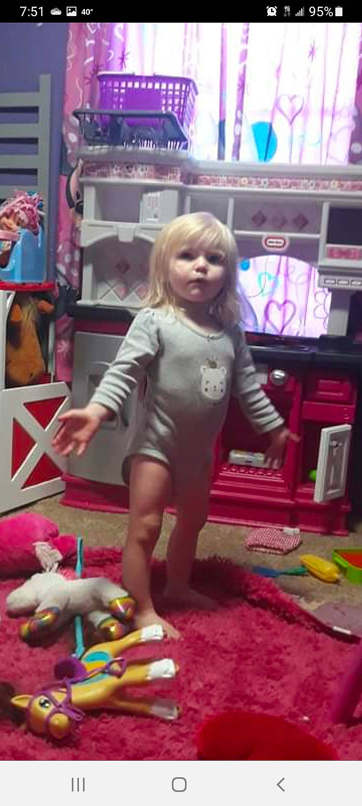 Kaylee is registered to the contest to win money with this photo: blond, child, fashion_design, floor, flooring, fun, human_leg, joint, magenta, person, photograph, pink, play, purple, room, shoe, snapshot, textile, thigh, toddler