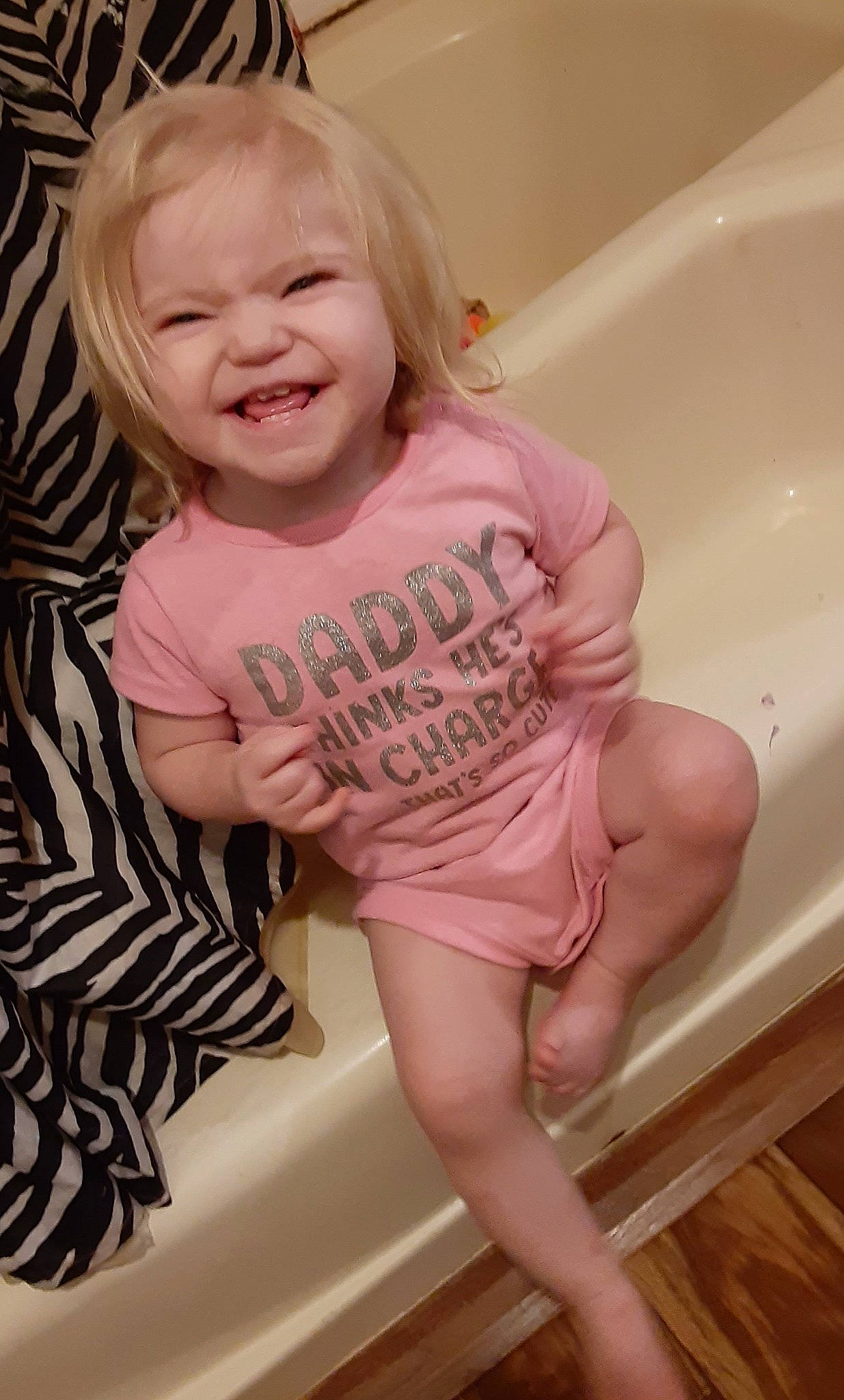 Kaylee joined the competition — help win amazing prizes! arm, baby, baby_toddler_clothing, bathroom, bathtub, cheek, eye, face, facial_expression, hand, head, human_body, mouth, neck, person, pink, shorts, skin, sleeve, smile