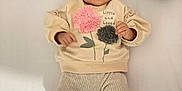 Alyana is registered to the contest to win money with this photo: baby, infant, headband, plush_toy, panda, cloud_toy, beige_clothing, flower_decoration, lying_down, white_background, cute, child, soft_toys, smiling_toy, cozy, adorable, young_child, infant_clothes, playtime, indoor