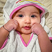 Alyana joined the competition — help win amazing prizes! baby, infant, towel, hood, cute, face, portrait, child, skin, hand, gesture, pink, white, fabric, soft, closeup, eyes, expression, indoor, background
