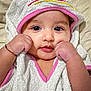 baby, infant, towel, hood, cute, face, portrait, child, skin, hand, gesture, pink, white, fabric, soft, closeup, eyes, expression, indoor, background